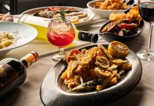 18 Valentine’s Day Dining Experiences in Metro Detroit Table of food and drinks from Aurora on the Lake