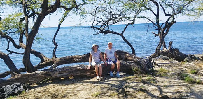 2025 Edee Gail with twin sister Emily T Gail ... walk Pu'ukohola Heiau National Historic Site tree Spencer Beach 20250204_125110.cx