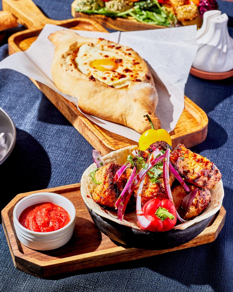 The chicken mtsvadi features tender chicken pieces that are marinated, then grilled over an open flame.