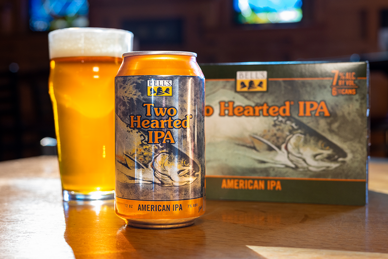 A pint, can, and case of Two Hearted IP from Bell's Brewery