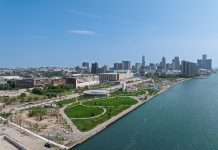 What to Expect When Ralph C. Wilson Centennial Park Opens This Month The lush 22-acre Ralph C. Wilson Centennial Park was once the site of the Detroit Free Press printing plant, before it was bought by the Detroit Riverfront Conservancy in 2007.