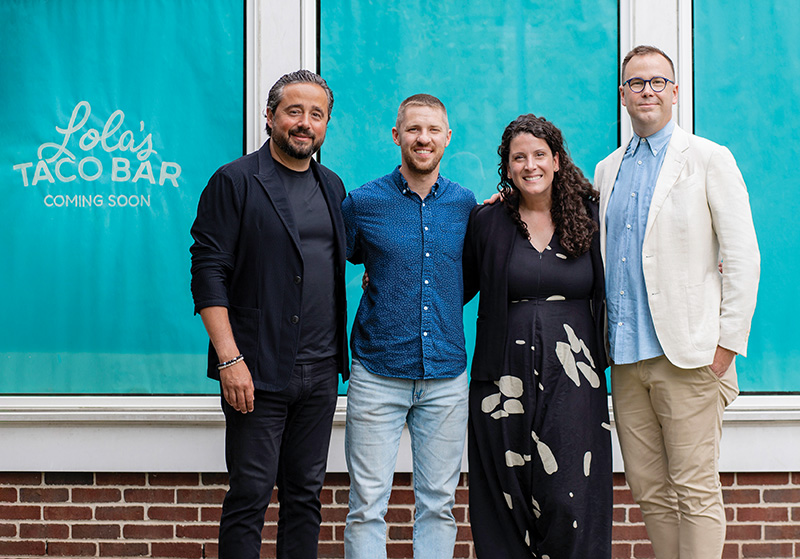 Three men and a woman outside of Lola's Taco Bar in Grosse Pointe Woods
