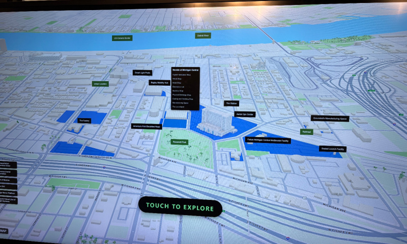 A touchscreen display at Michigan Central Station provides a snapshot of the current campus layout and future plans for the 30-acre site.
