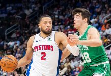 Cade Cunningham dribbling the ball down the court.