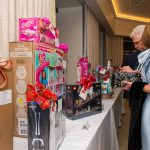 Guests peruse the silent auction table at the National Kidney Foundation of Michigan's 2025 Kidney Ball