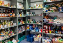 Fully stocked shelves at a food bank.
