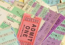 A pile of various concert tickets.