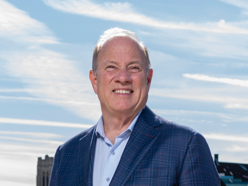 Detroit Mayor Mike Duggan standing on a sidewalk