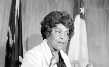 Erma Henderson speaking with reporters.