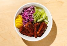 Little Kim’s fried tofu rice bowl is made with red cabbage, pickled daikon, and broccolini, dressed with tahini and sesame soy.