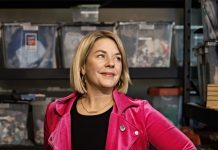 Hour Detroiters 2026: Amy Peterson Rebel Nell co-founder and CEO Amy Peterson stands in front of bins containing pieces of Detroit history at Rebel Nell’s headquarters in Detroit.