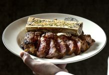 Hour Detroit’s 2026 Restaurant of the Year: Rudy’s Prime Steakhouse in Clarkston A steak plated with bone marrow.