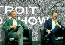Michigan State University President Kevin M. Guskiewicz and former Secretary of Transportation Pete Buttigieg address questions during the Media and Industry preview of the 2026 Detroit Auto Show