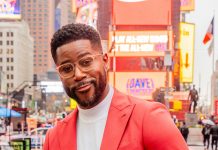 Nate Burleson posing with of Valentine's LionBlood vodka.