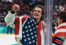 Jack Hughes #86 of Team United States celebrates after their gold-medal win during the Men's Gold Medal match between Canada and the United States on day 16 of the Milano Cortina 2026 Winter Olympic games at Milano Santagiulia Ice Hockey Arena on February 22, 2026 in Milan, Italy.
