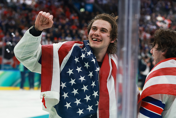 Jack Hughes #86 of Team United States celebrates after their gold-medal win during the Men's Gold Medal match between Canada and the United States on day 16 of the Milano Cortina 2026 Winter Olympic games at Milano Santagiulia Ice Hockey Arena on February 22, 2026 in Milan, Italy.
