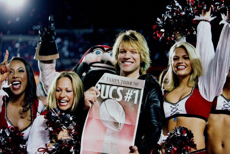 This photo of Jon Bon Jovi was taken at Super Bowl XXXVII (2003), where the Bucs upset the Raiders and Bon Jovi performed in a post-game show. “He just got up on stage and began playing," says Donoghue. “I have shot them about three or four times in concert.” 