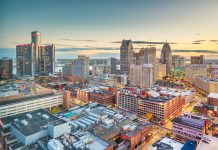 Detroit, Michigan, USA downtown skyline from above at dusk.
