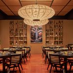 The wall of sake features some of Dec’s favorite bottles from his travels to Japan.