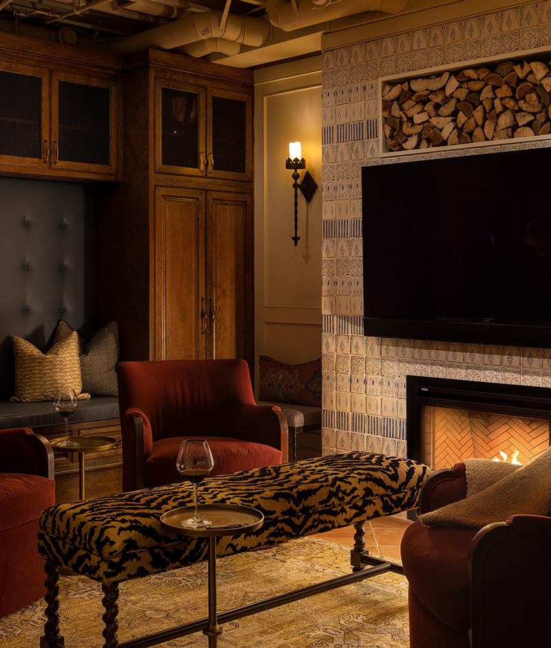 Seating area with an animal print ottoman.