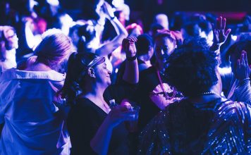 Women dancing at an Earlybirds Club event.
