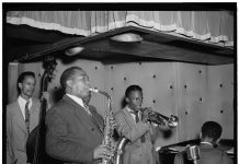 Miles Davis performs with Charlie Parker at the Three Deuces in New York City, 1947.