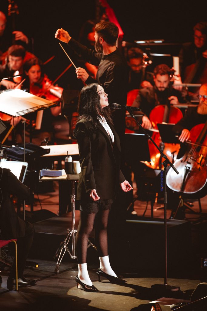 St. Vincent performing with an orchestra.