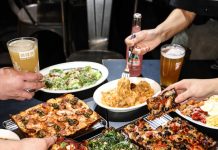 How Detroit-style Pizza Became Popular in Seoul A table full of multiple Detroit-style pizza.